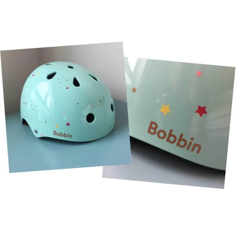 Bobbin Starling bike helmet with star pattern (S/M) Bobbin Starling bike helmet with star pattern (S/M)